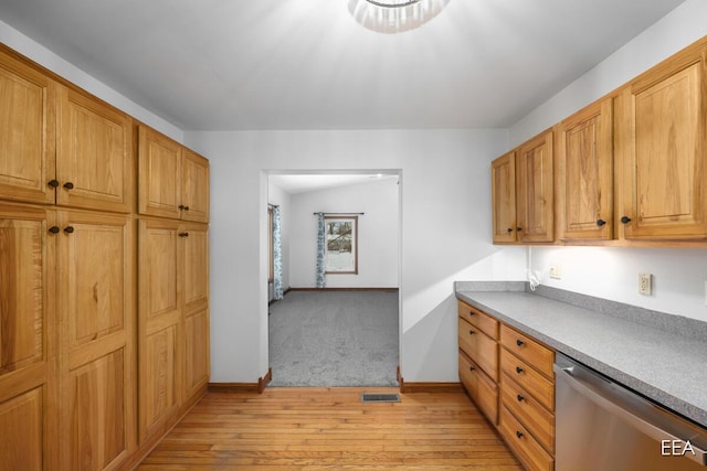 kitchen with dishwasher and light hardwood / wood-style floors