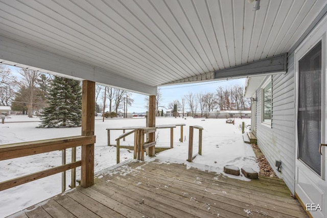 view of snow covered deck