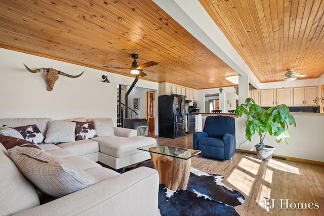 living room featuring light wood-type flooring, wooden ceiling, and ceiling fan