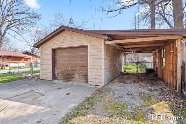 garage featuring a carport