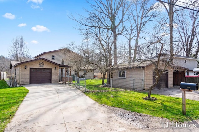 single story home featuring a garage and a front lawn