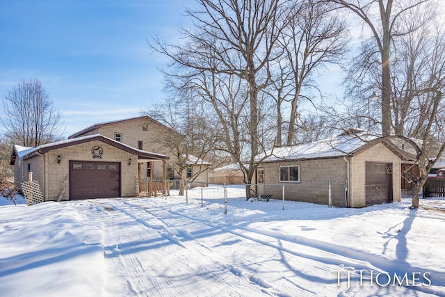 view of front of home with a garage