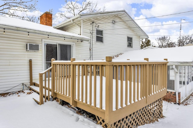 view of snow covered deck