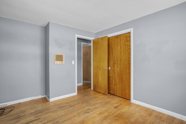 spare room with light hardwood / wood-style floors