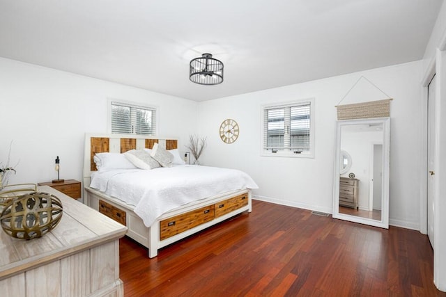 bedroom featuring dark hardwood / wood-style floors