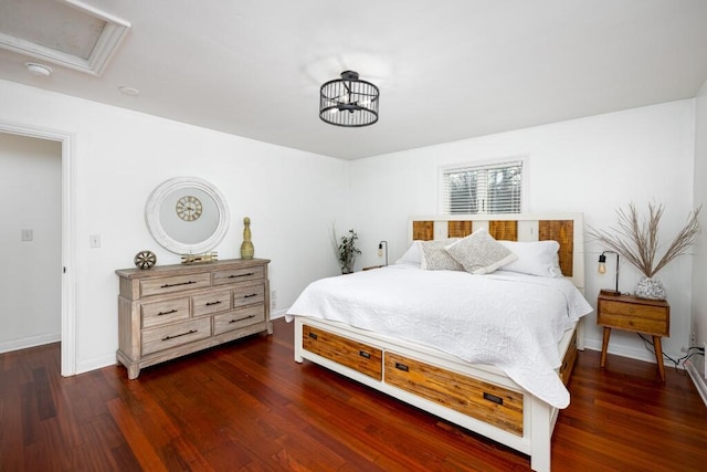 bedroom featuring dark hardwood / wood-style floors