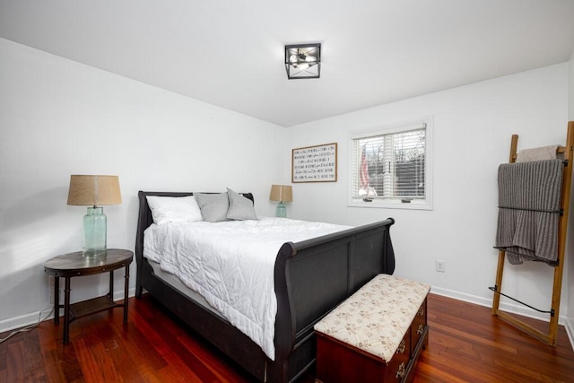 bedroom featuring dark hardwood / wood-style flooring