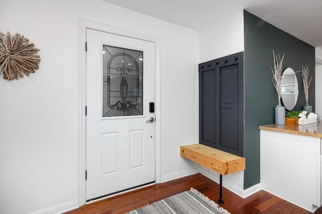 entrance foyer featuring dark hardwood / wood-style floors