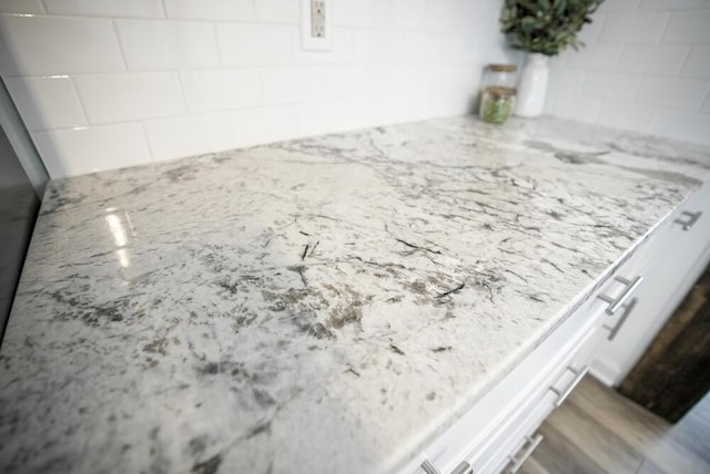 interior details featuring white cabinetry