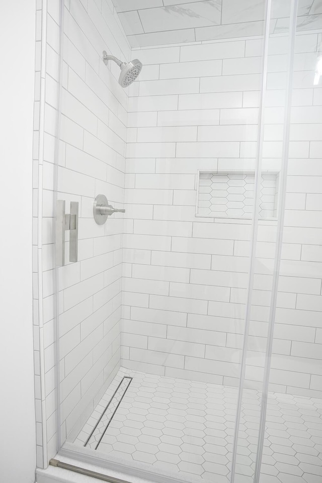 bathroom featuring an enclosed shower