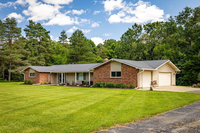 ranch-style home with a garage and a front yard