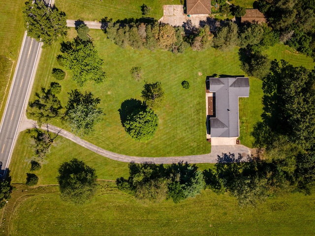 birds eye view of property with a rural view