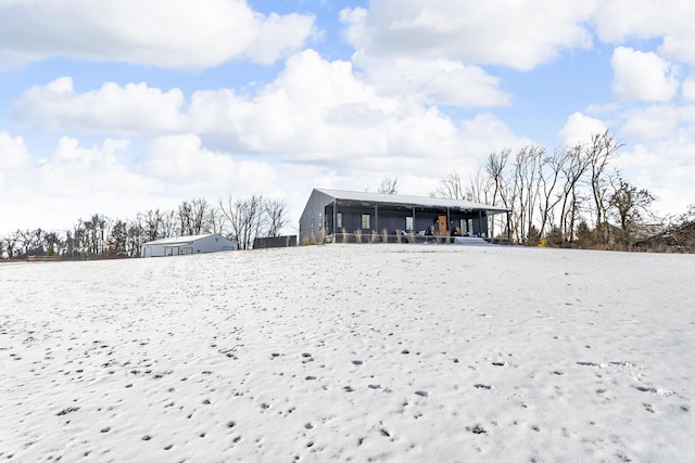 view of snow covered property