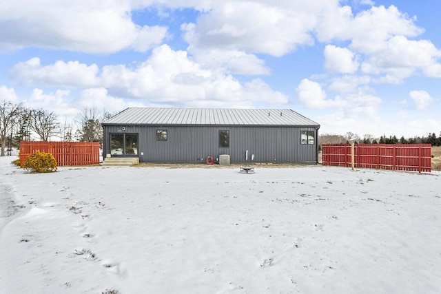 view of snow covered house