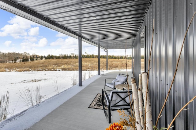 view of snow covered patio