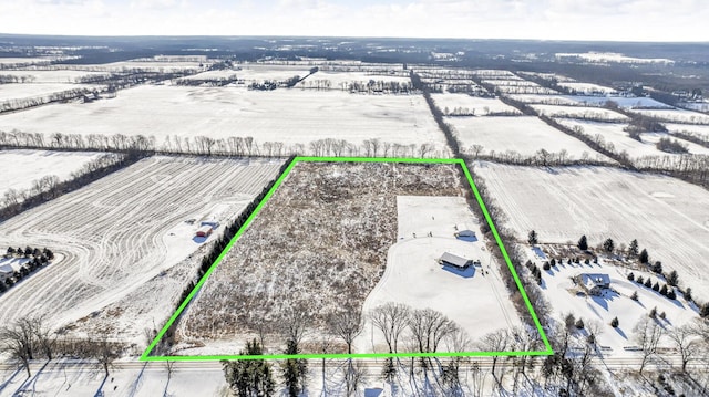 snowy aerial view with a rural view