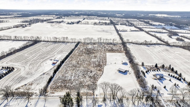 snowy aerial view with a rural view