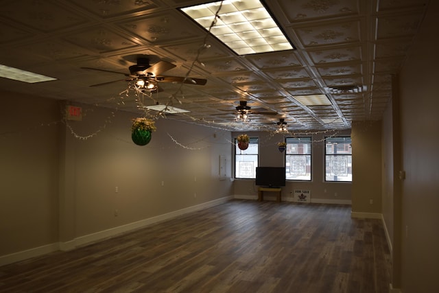 unfurnished room featuring ceiling fan, wood-type flooring, and coffered ceiling