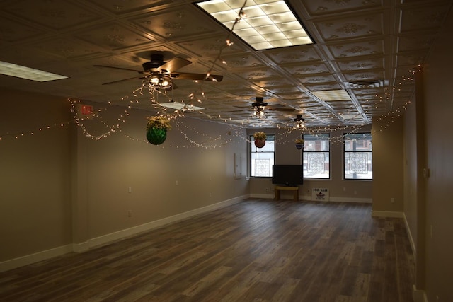 unfurnished room with ceiling fan and hardwood / wood-style flooring