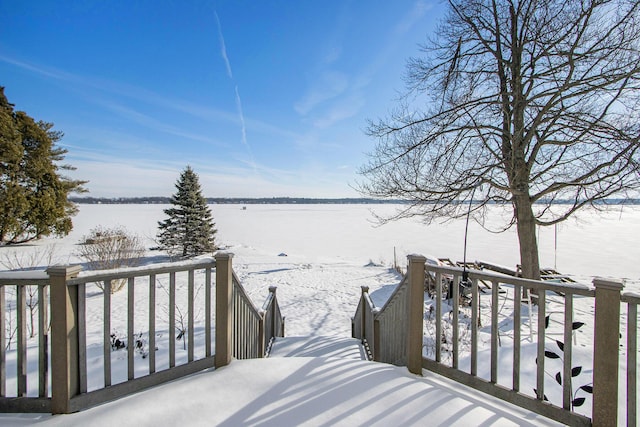 view of snow covered deck