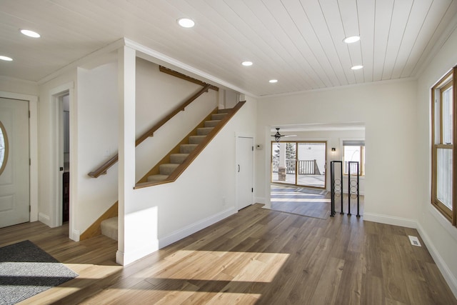 foyer featuring crown molding, wood ceiling, hardwood / wood-style flooring, and ceiling fan