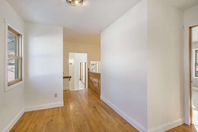 hallway featuring light hardwood / wood-style floors