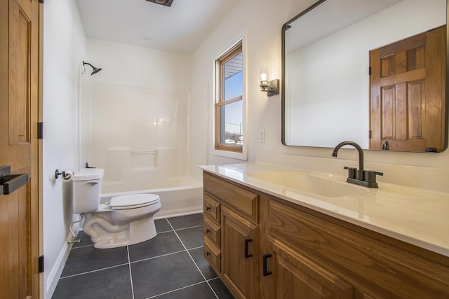 full bathroom featuring toilet, tile patterned flooring, vanity, and shower / bathing tub combination