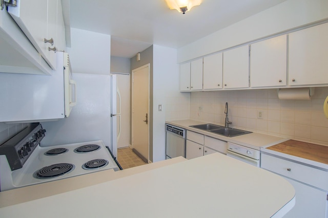 kitchen with range with electric stovetop, tasteful backsplash, dishwasher, white cabinets, and sink