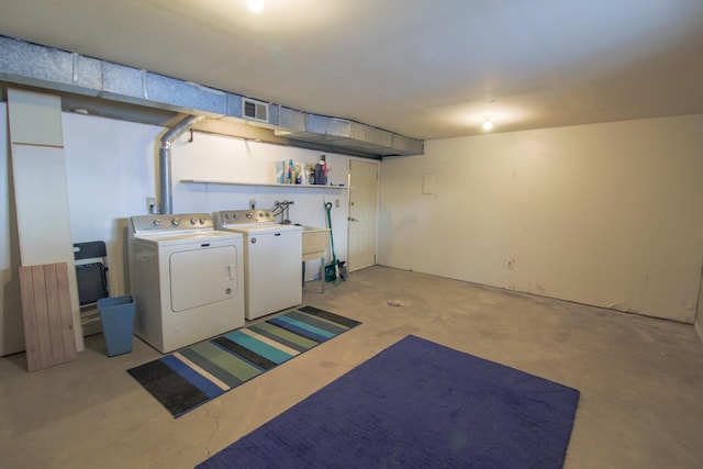 basement featuring washer and clothes dryer