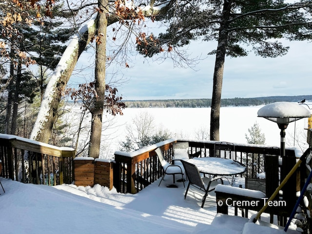 view of snow covered deck