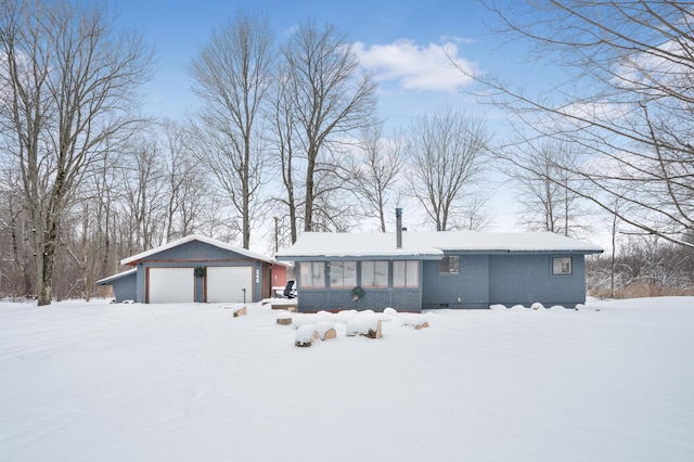 single story home featuring a garage