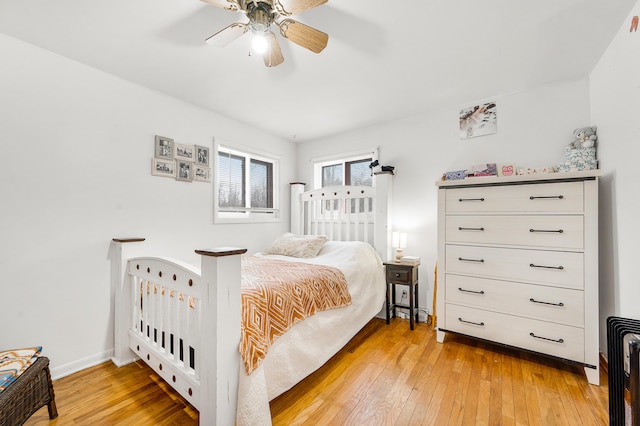 bedroom featuring ceiling fan and light wood-type flooring