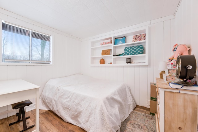 bedroom with light wood-type flooring