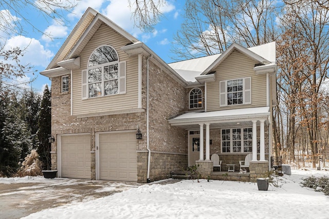 view of front of property with a garage