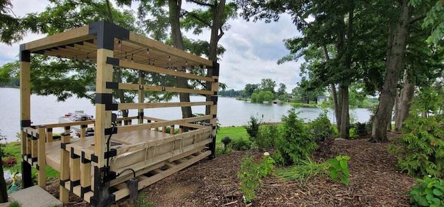 dock area featuring a water view