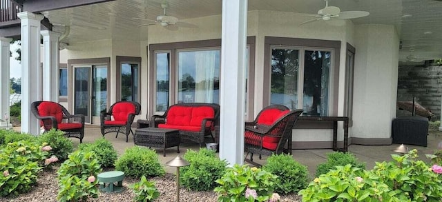 view of patio / terrace featuring ceiling fan and an outdoor living space