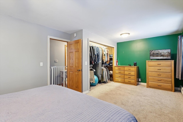 bedroom with a closet and carpet flooring