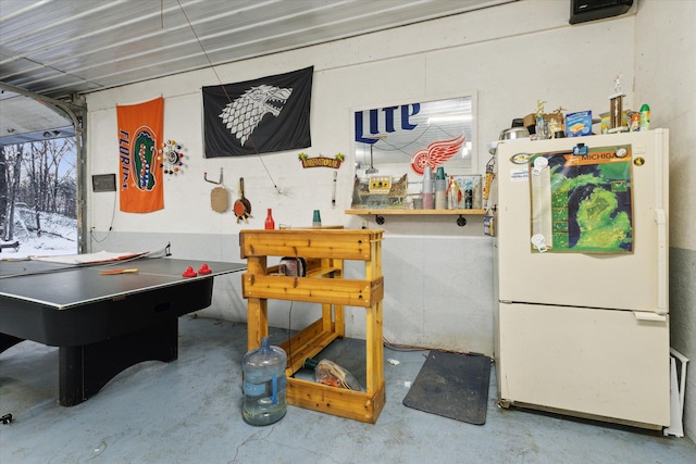 playroom with concrete flooring