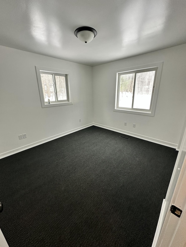 view of carpeted spare room