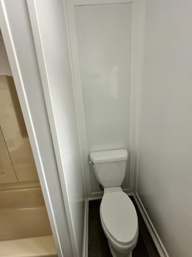 bathroom featuring toilet