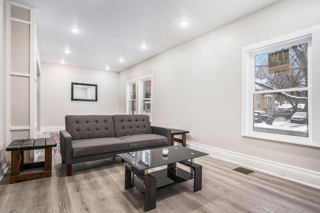 living room featuring light wood-type flooring