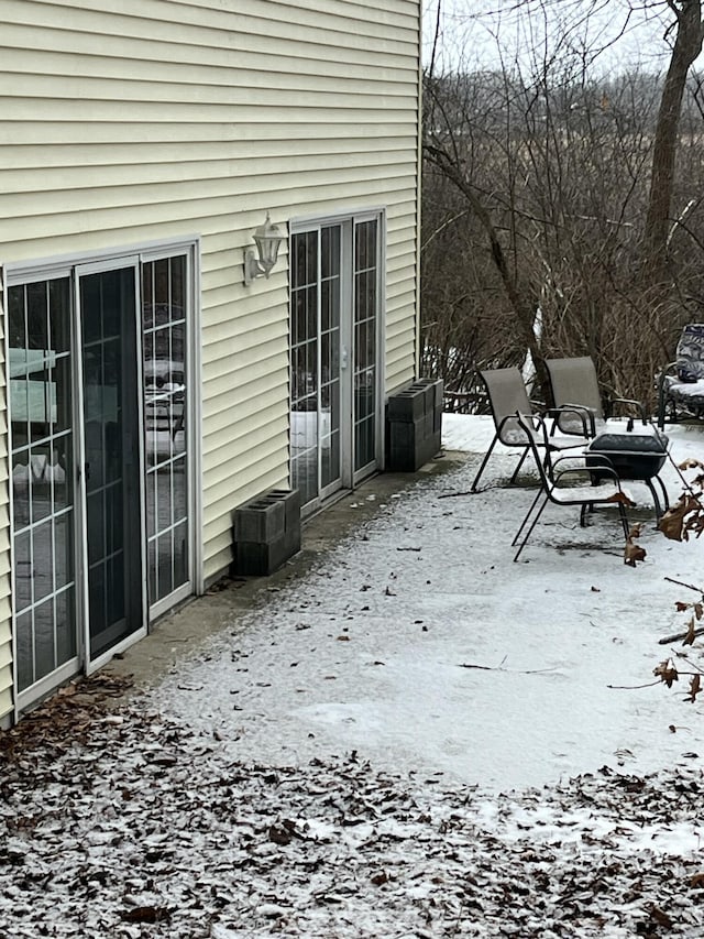 view of snow covered patio