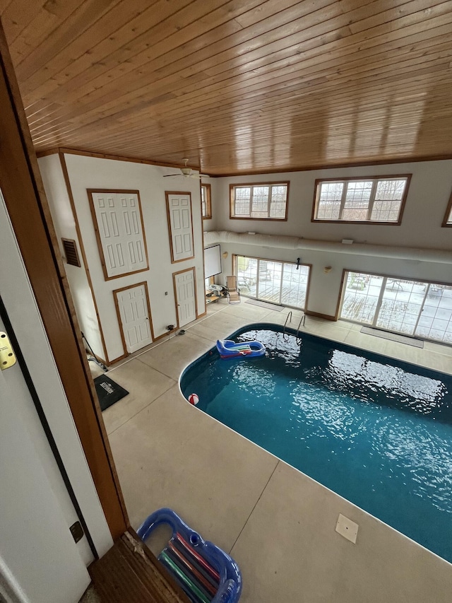 view of pool with ceiling fan