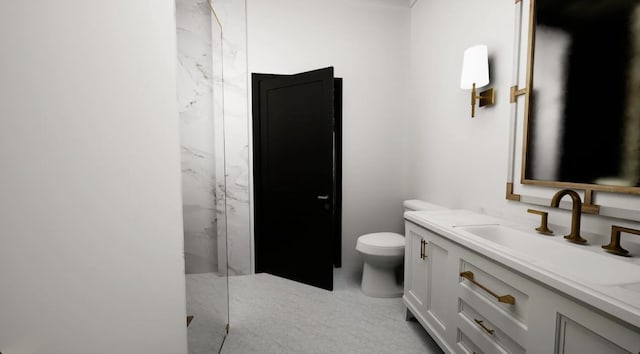 bathroom featuring toilet, a shower, and vanity