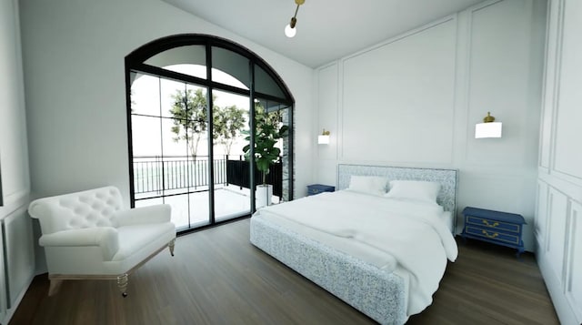 bedroom featuring access to outside and dark hardwood / wood-style flooring