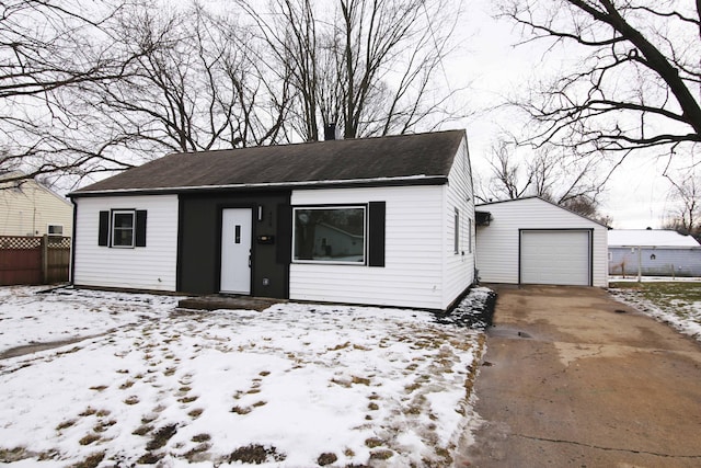 view of front of house featuring an outdoor structure and a garage