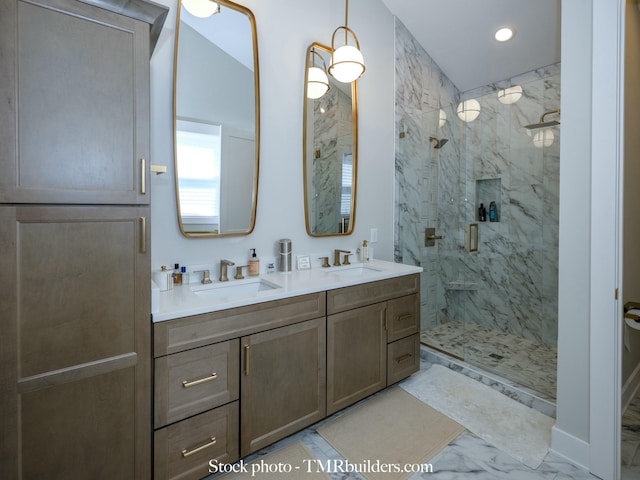 bathroom featuring walk in shower and vanity