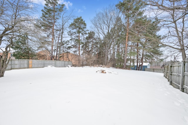 view of yard covered in snow