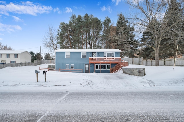 view of front of house with a wooden deck