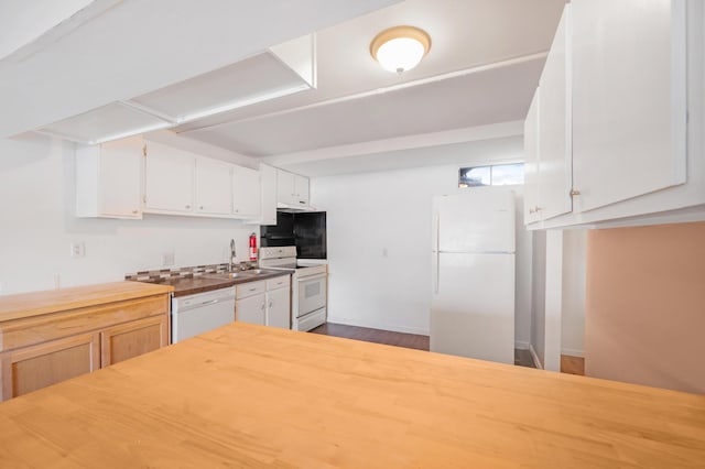 kitchen featuring white cabinetry, white appliances, butcher block counters, and sink